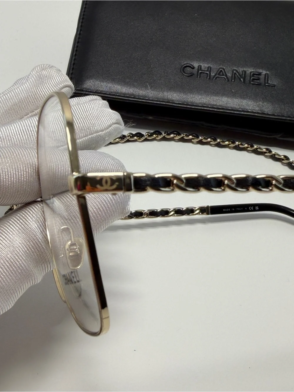 CHANEL  Gold and Black Eye ear Chain with Silver-Tone Glasses